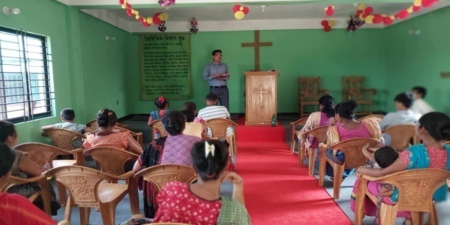 BCBT leader preaching to a local church congregation