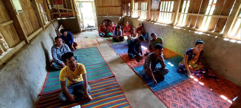 BCBT guest speaker teaching inside a village church